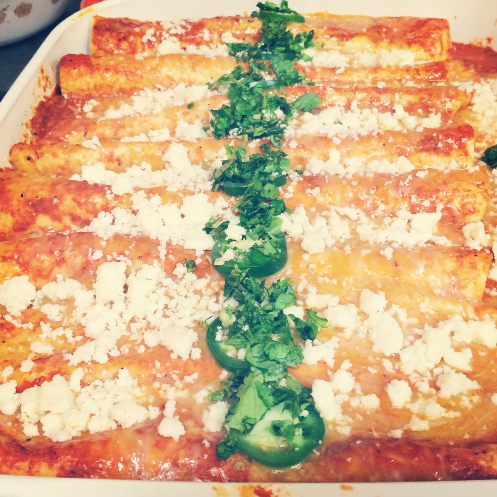 Caramelized Onion & Spinach Enchiladas with a Creamy Roasted Red Pepper-Cilantro Sauce