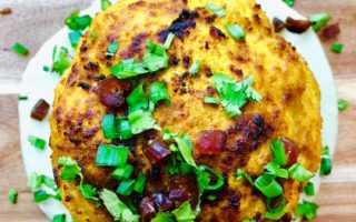 Whole Roasted Cauliflower with Turmeric, Fennel Seed, & Dates